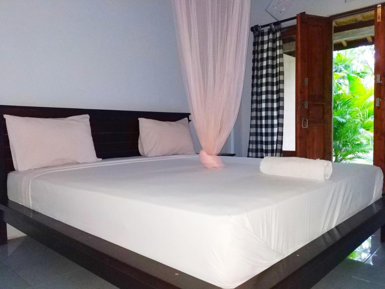 Angga Guest House ペムテラン エクステリア 写真